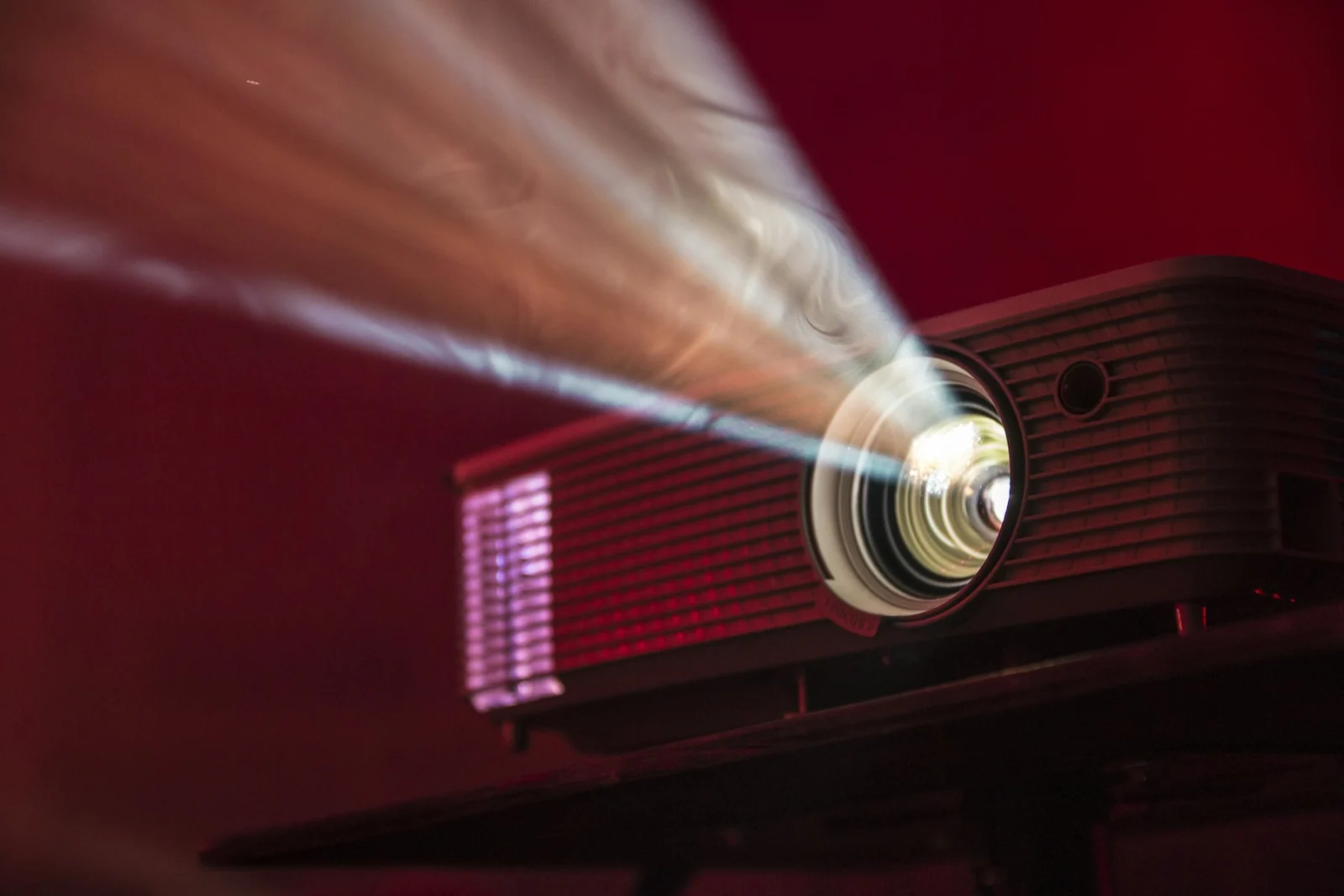 A film projector beam in a dark room